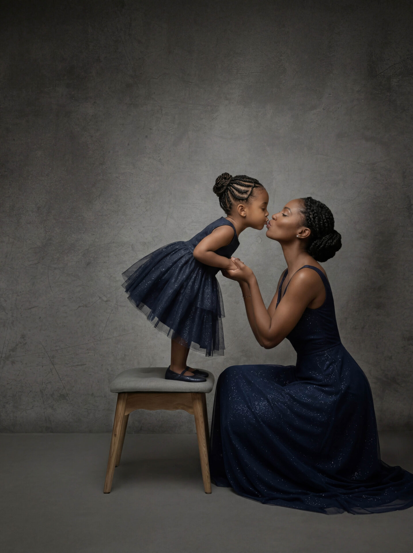 Mother and daughter bonding during a photoshoot